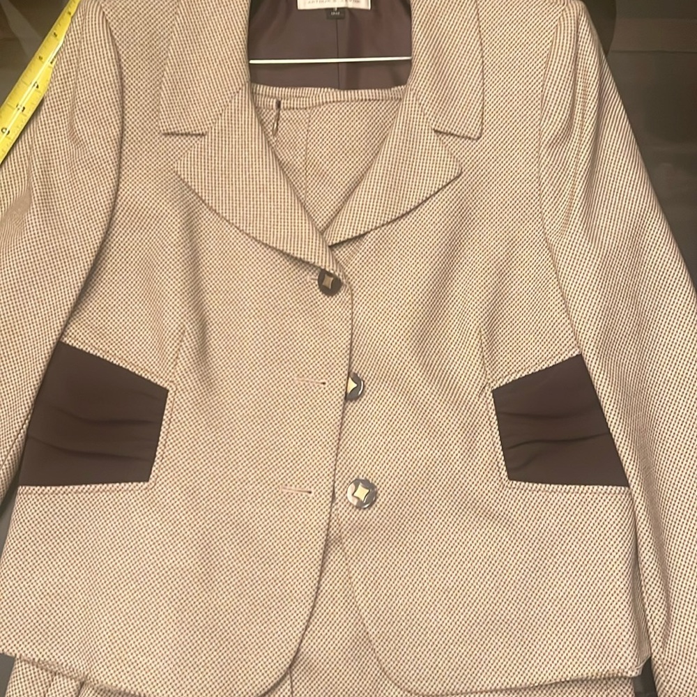 Brown beauty, knockout, two piece suit. Never worn.